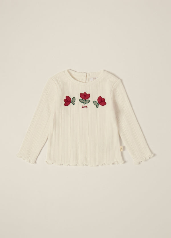 Maglia bianca a maniche lunghe per neonata